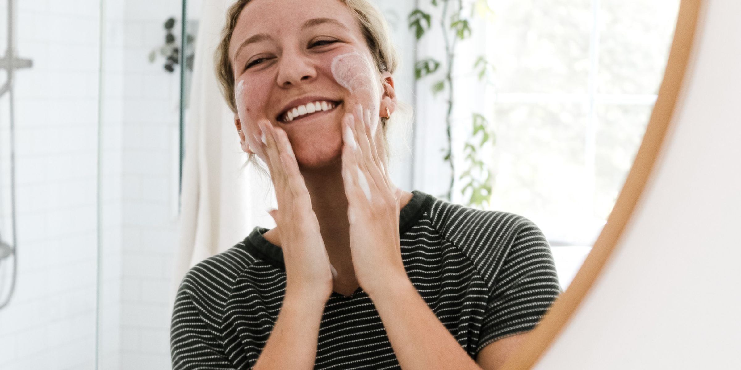 withSimplicity Acne Prone Natural skincare. Girl washing was with foaming face wash