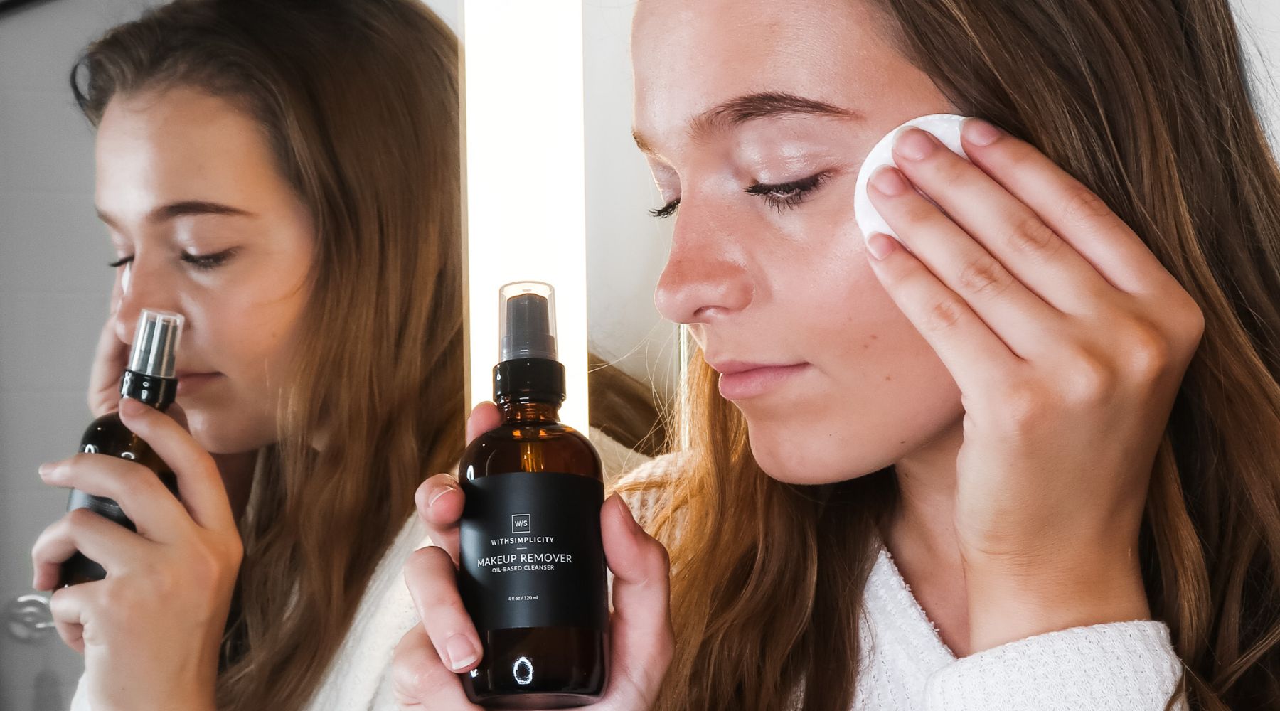Woman using oil-based makeup remover by withSimplicity