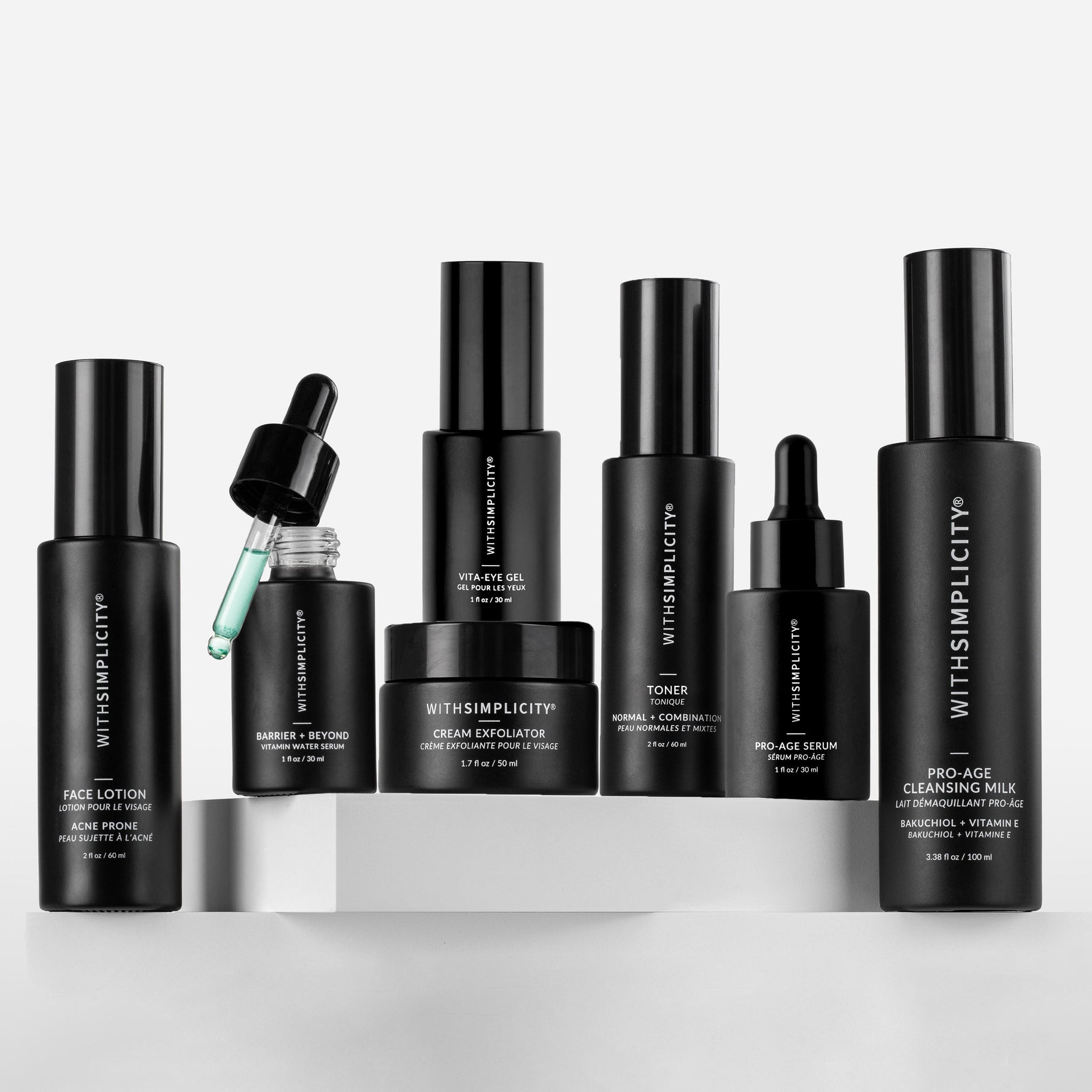 withSimplicity clean skincare products in black bottles on a light gray background