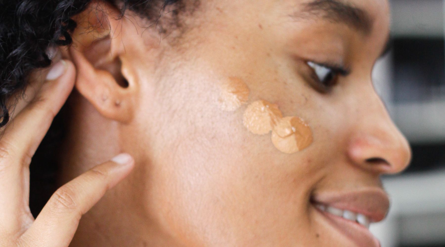 girl with foundation swatches on face. How to determine your skin's undertone