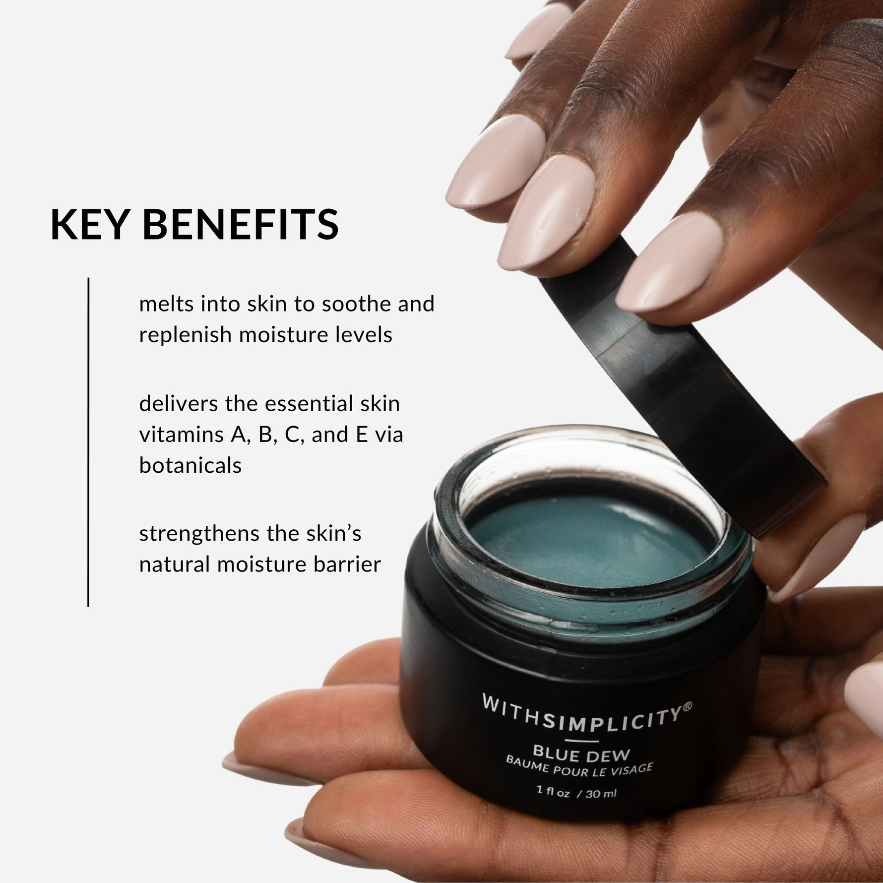 withSimplicity Blue Dew Nourishing Natural Beauty Balm with Blue Tansy Oil. Text on image: melts into skin to sooth and replenish moisture levels, delivers the essential skin nutrients - Vitamins A, B, C, and E, and strengthens and replenishes the skin's natural moisture barrier.