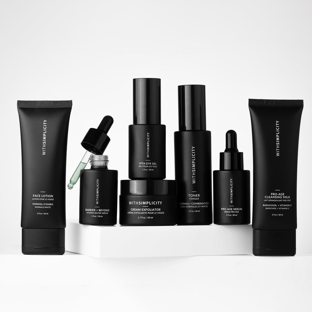 Collection of black withSimplicity skincare products with withSimplicity branding on a white background