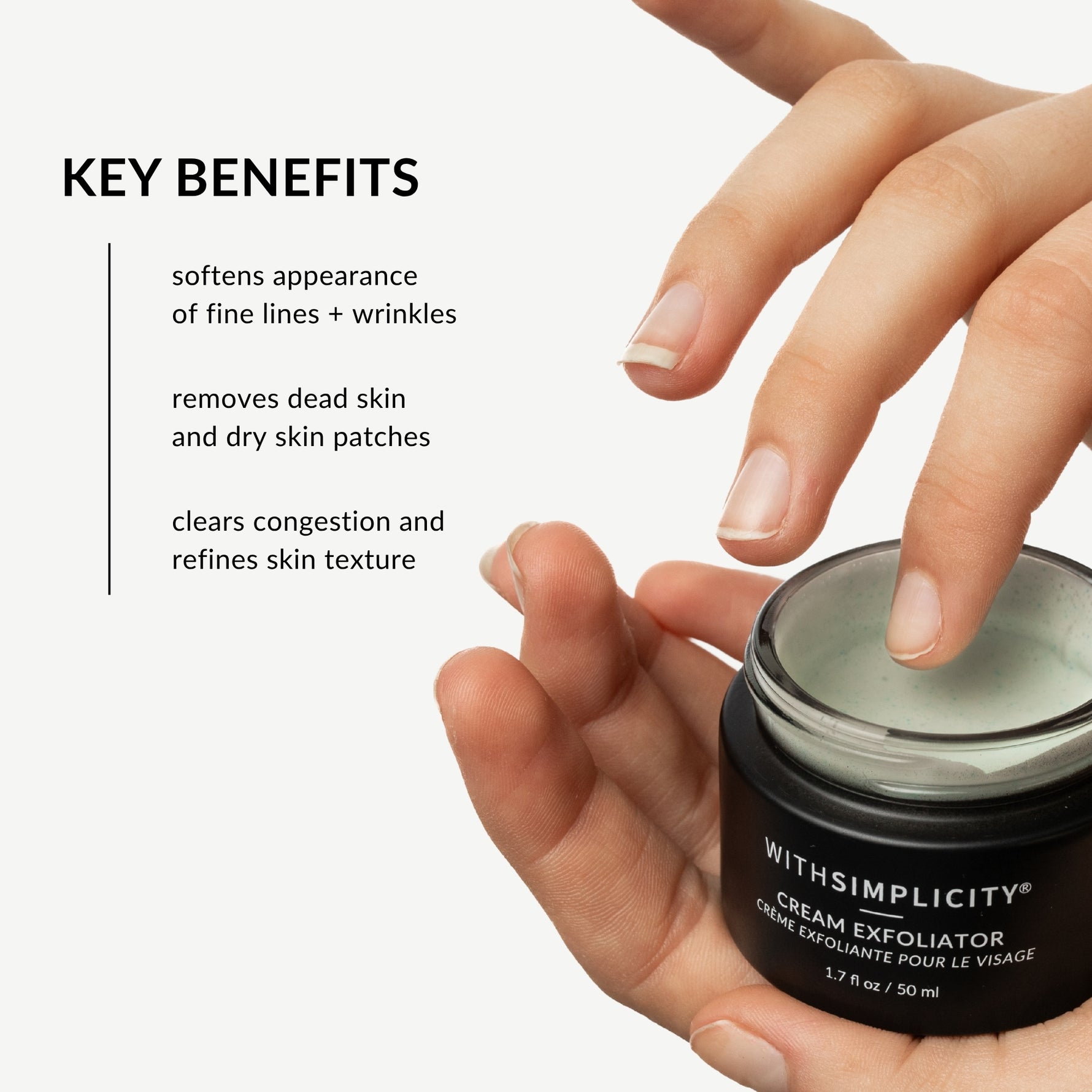 A hand holds an open black jar of WithSimplicity Cream Exfoliator while another hand reaches in for a dollop of the product. The left side features a white panel with black text outlining key benefits of the exfoliator.