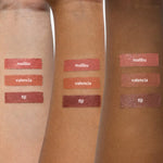 swatches of withSimplicity Tri-Sticks on three different arms of different skin colors