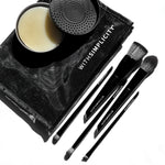 withSimplicity mesh cosmetic bag with five black makeup brushes and a brush cleansing balm on a white background