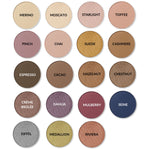 Collection of eyeshadow shades with names on a white background. Names from upper left to bottom right are Merino, Moscato, Starlight, Toffee, Pinch, Chai, Suede, Cashmere, Espresso , Cacao, Hazelnut, Chestnut, Creme Brulee, Dahlia, Mulberry, Seine, Eiffel, Medallion, and Riviera.