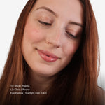 Close-up of a woman with makeup products listed on a white background. Products listed are Tri-Stick Malibu, Lip gloss Peony, Eyeshadow Starlight