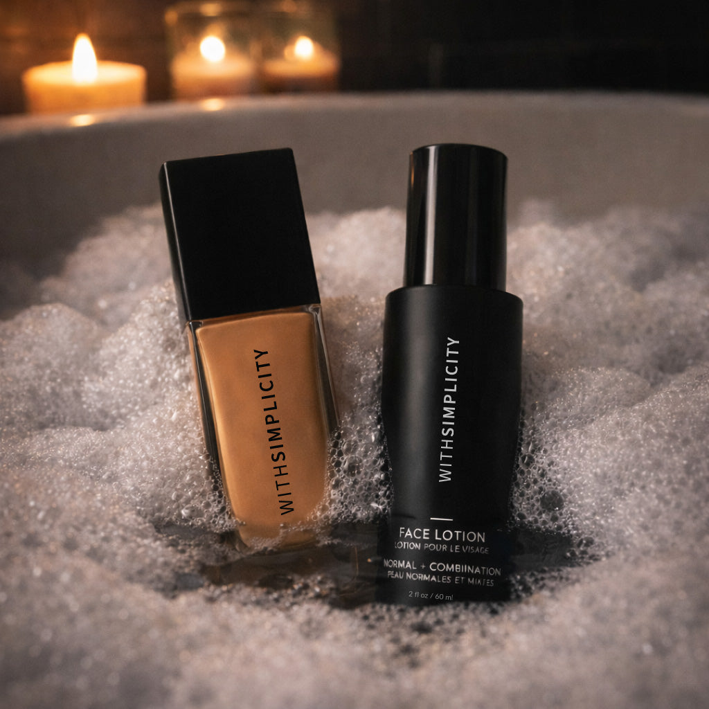 withSimplicity Liquid Foundation and Face Lotion sitting in a bubble bath together with dim lighting and candles