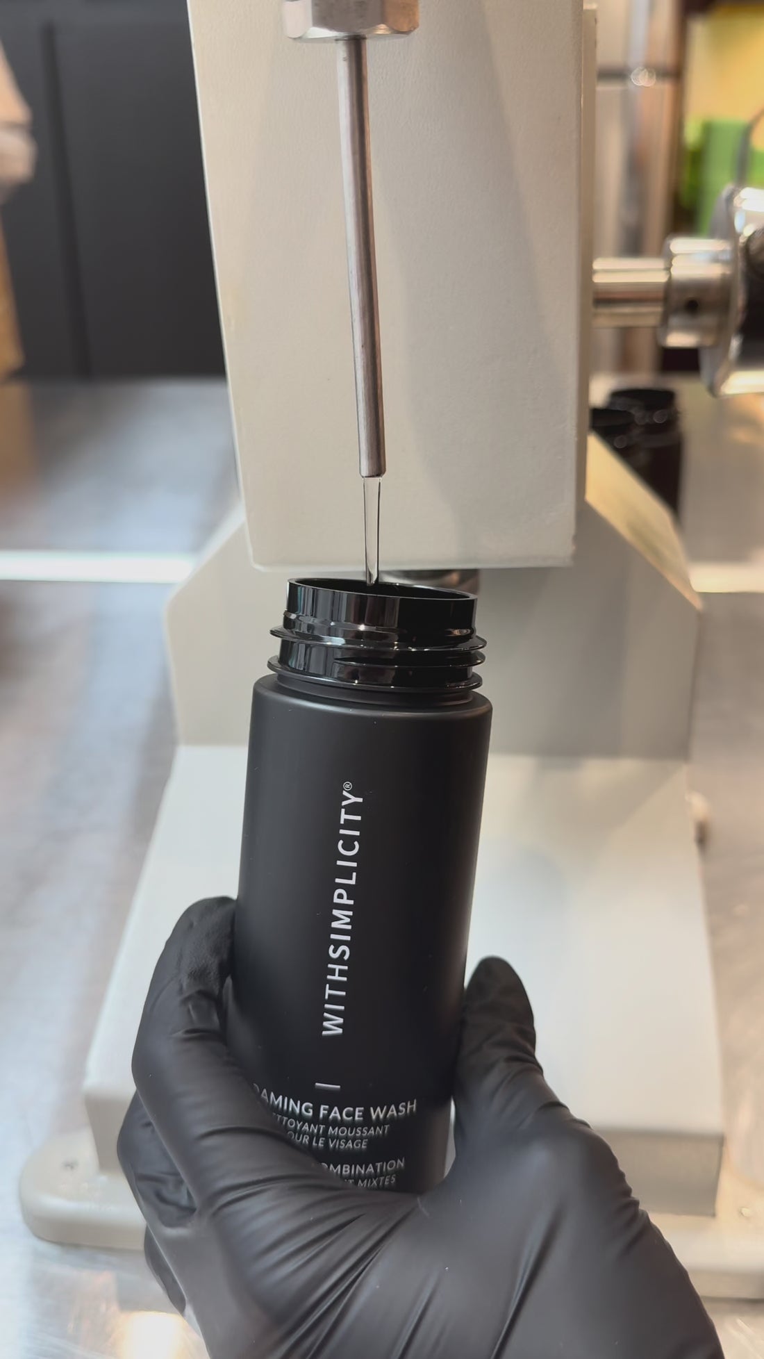 Video of withSimplicity Face Wash being filled with product