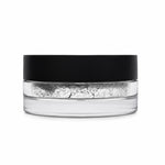 Clear container with black lid filled with white powder on a white background