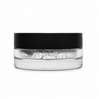 Clear container with black lid filled with white powder on a white background