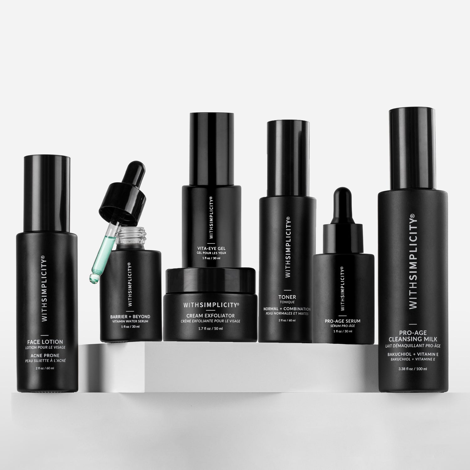 Collection of black withSimplicity skincare products with withSimplicity branding on a white background