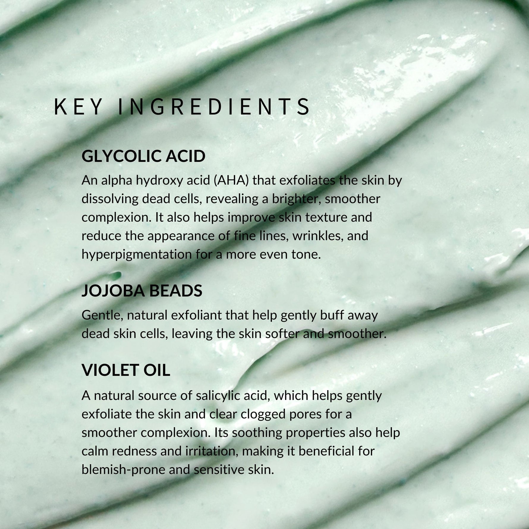Text detailing key ingredients of a skincare product with a close-up of blue skin texture. Key ingredients are Glycolic Acid, Jojoba Beads, and Violet Oil.