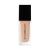 Foundation bottle with black cap and beige body on a white background