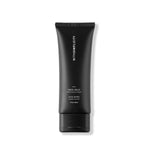 A black squeeze tube of withSimplicity Face Jelly on a clean white background.