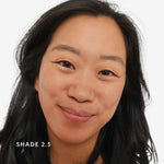 Person with dark hair on a white background, labeled 'Shade 2.5'.