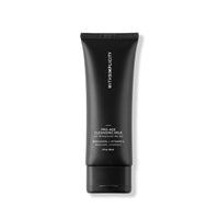 Black lotion tube with withSimplicity and Pro-Age Cleansing Milk on it against a white background